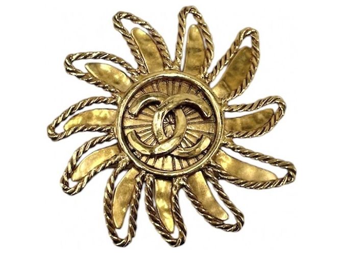 Spilla Chanel placcata in oro D'oro