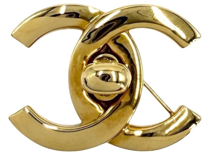 Spilla Chanel placcata oro D'oro