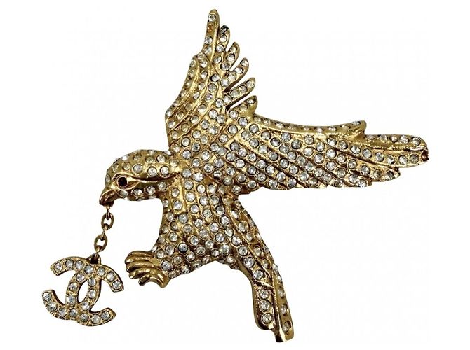 Spilla Chanel Vintage placcata in oro e strass D'oro