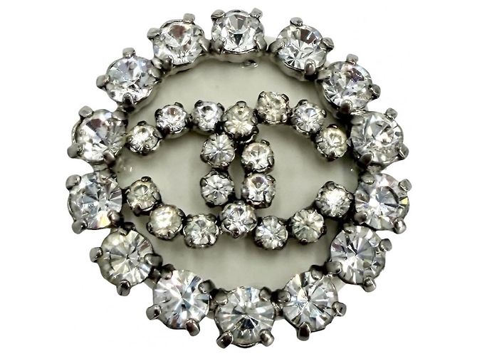 Broche redonda Chanel com strass