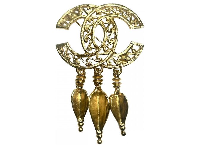 Spilla Chanel Vintage placcata oro D'oro