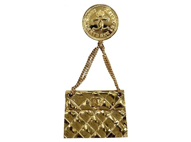 Spilla Chanel Vintage placcata oro D'oro
