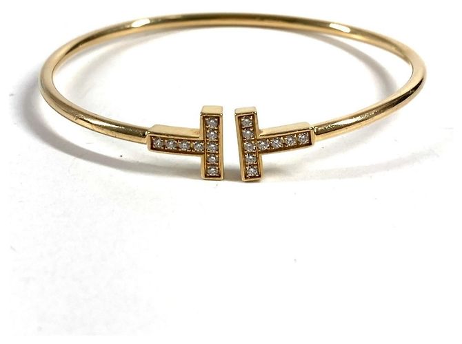 Bracciale con charm in oro 18K e diamanti Tiffany & Co. D'oro