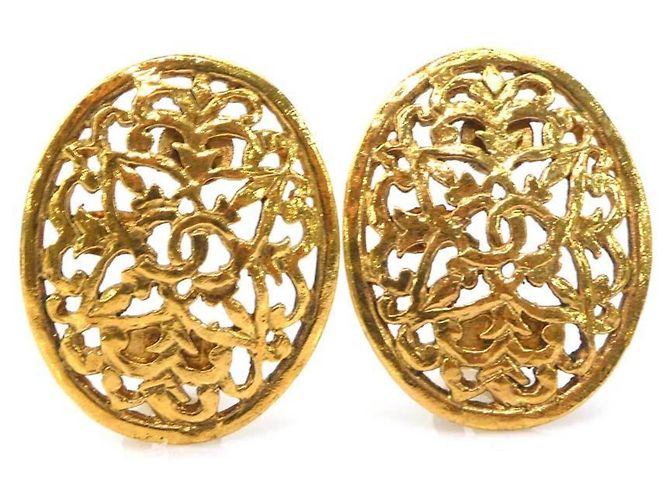 Boucles d'oreilles à clip dorées Chanel
