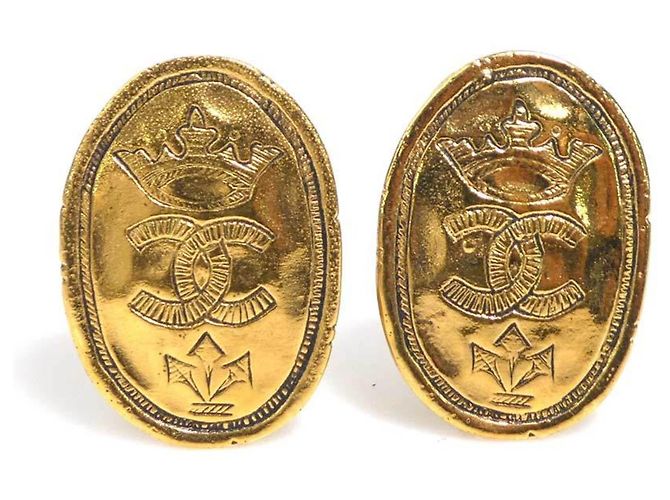 Boucles d'oreilles à clip en métal doré Chanel