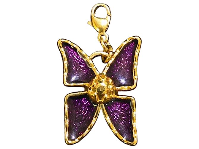 Yves Saint Laurent Pendentif papillon en métal doré et émail violet 