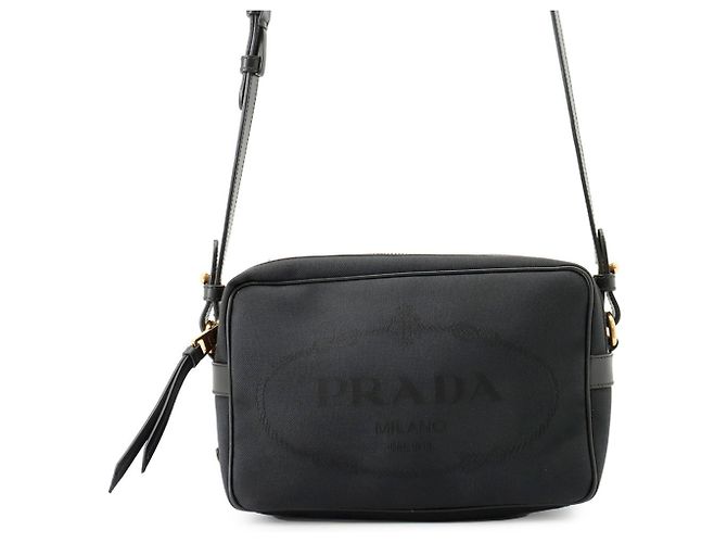 Bolsa de tiracolo Prada preta de pele e lona Preto