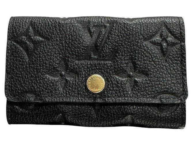 Porta-chaves Monogram Empreinte Louis Vuitton Preto
