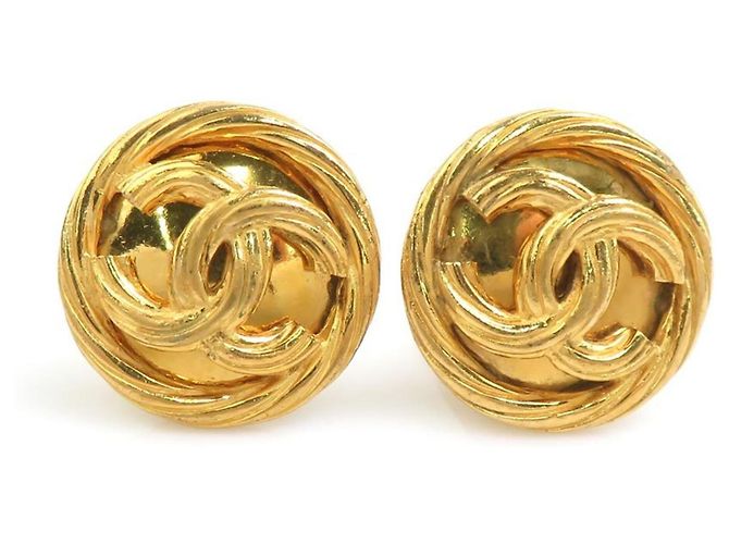 Boucles d'oreilles à clip dorées Chanel