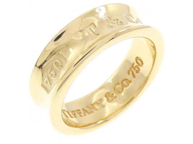 Anel de banda Tiffany & Co. 1837 em ouro amarelo