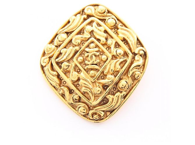Spilla Chanel Coco Mark Arabesque D'oro