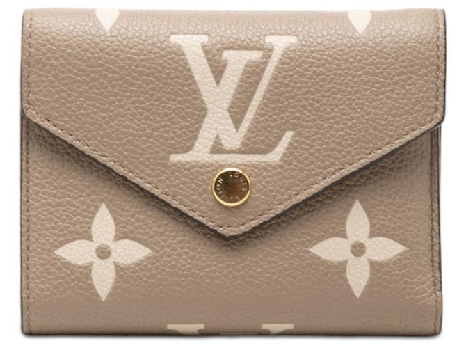 Cartera Victorine tríptico en Monogram Empreinte Louis Vuitton Beige Gris Crudo