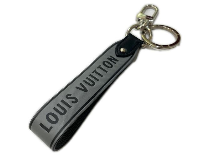 Louis Vuitton Monogram Eclipse Capital LV Keychain Brown
