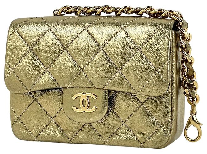 Charm per borsa Chanel in pelle dorata D'oro