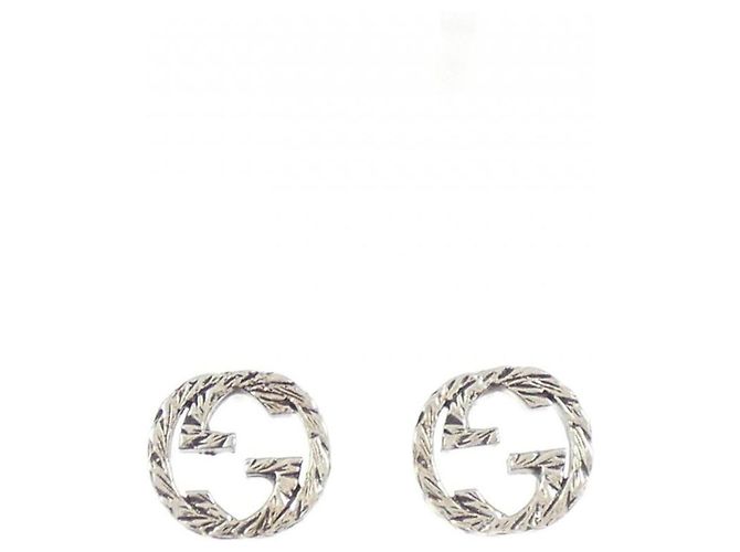 Pendientes de botón Gucci Interlocking G en plata