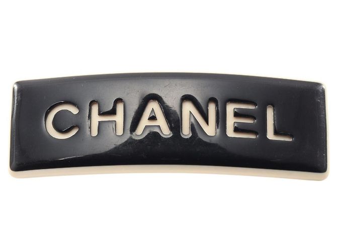 Barrette in plastica bianco e nero Chanel 