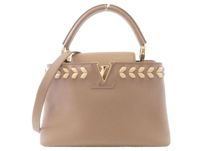 Bolsa Louis Vuitton Capucines PM M54882 Bege