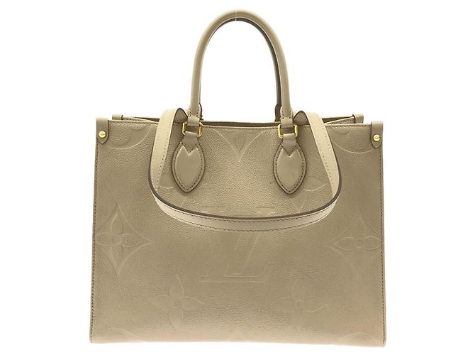 Bolso Louis Vuitton Monogram Empreinte OnTheGo MM Gris