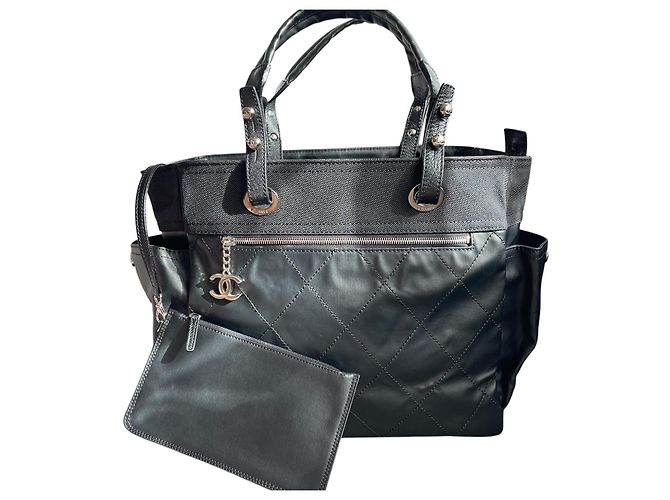 Bolsa Tote Chanel Paris Biarritz em couro acolchoado preto e tecido