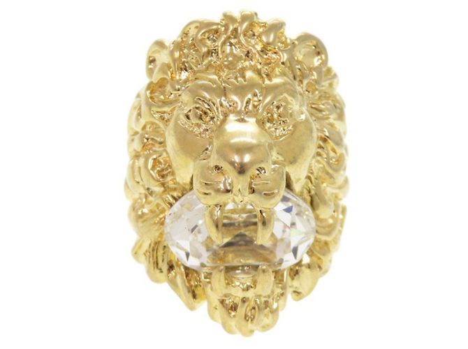 Anel de metal com cabeça de leão e pedra Gucci Dourado