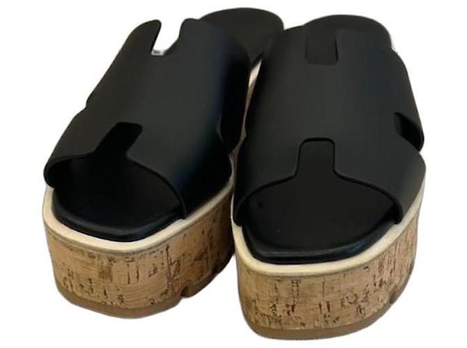 Hermès Sandali con zeppa in pelle nera Oran Nero