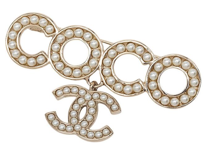 Spilla Chanel Coco Mark placcata oro D'oro