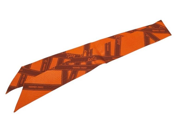 Lenço Hermès Twilly BOLDUC em seda laranja