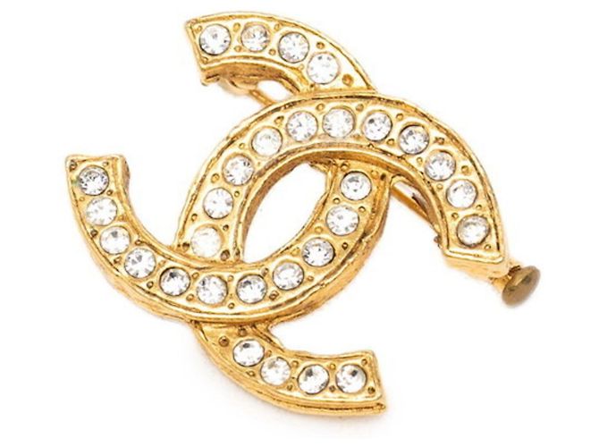 Timeless Broche Chanel Coco Mark en baño de oro Dorado
