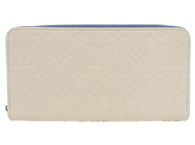 Cartera Zippy Monogram Empreinte Louis Vuitton Azul Crudo
