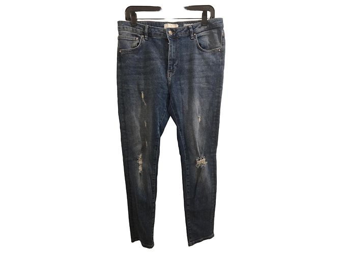 Met Vaqueros slim azul lavado con rotos