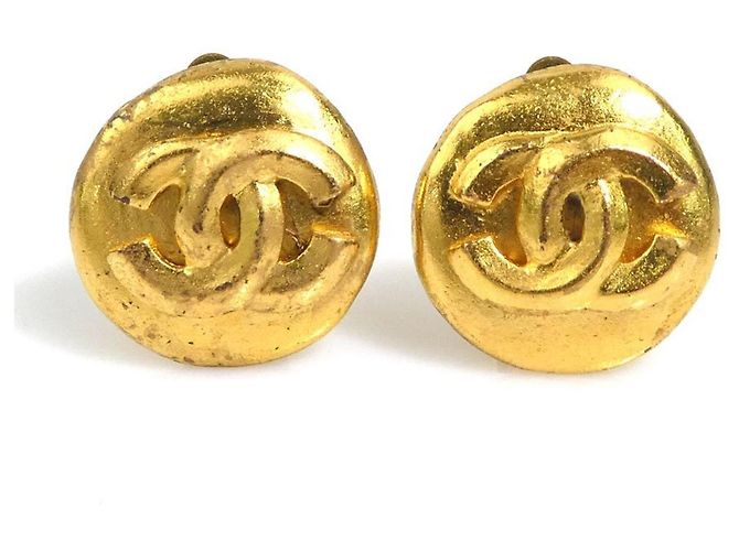 Boucles d'oreilles à clip dorées Chanel