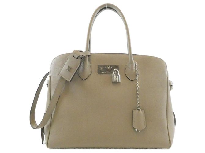 Bolsa Louis Vuitton Mila MM M51685 Bege Cinza