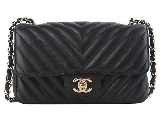 Chanel Mini bolsa transversal Classic Chevron em pele de cordeiro com ferragens douradas Preto
