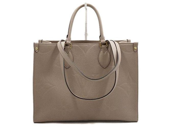 Louis Vuitton Bolsa Tote Monogram Empreinte OnTheGo MM Marrom