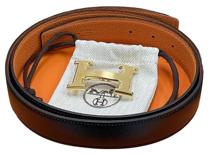 Hermès Cinturón reversible Negro/Oro mate Naranja