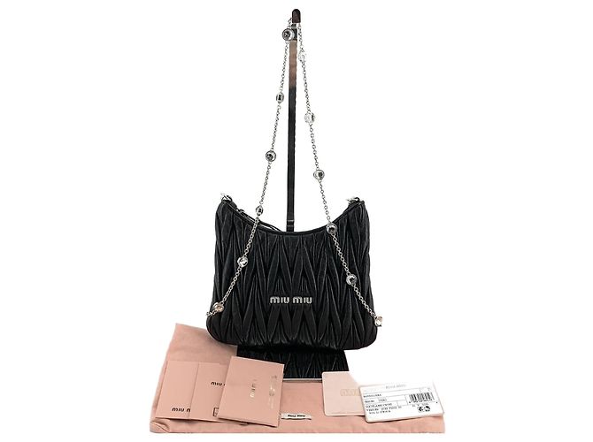 Miu Miu Bolsa transversal com corrente de cristal