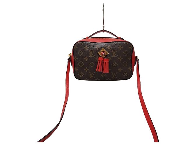 Louis Vuitton Bolsa transversal em canvas Monogram Vermelho