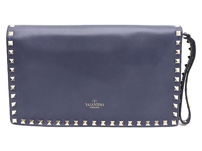 Valentino Clutch Rockstud com aba em dourado Azul