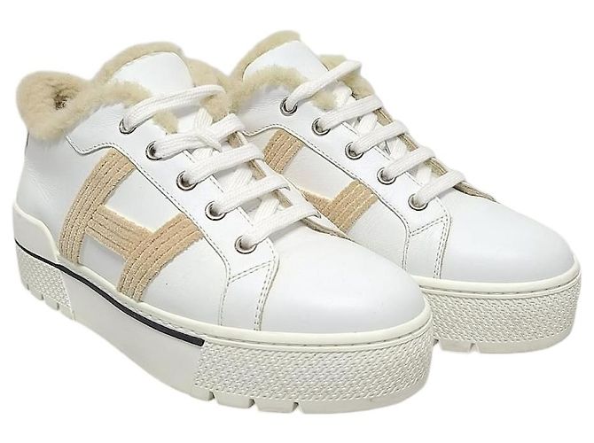 Hermès Zapatillas Abain-Taj de shearling con logotipo blanco