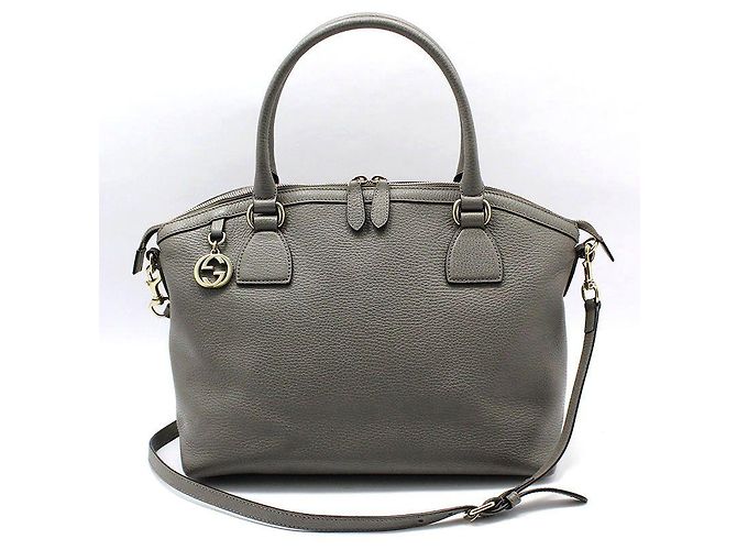 Gucci Bolsa de ombro com duplo domo entrelaçado em couro cinza e tom dourado Marrom