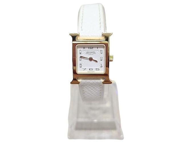 Hermès Reloj Apple Hour Mini chapado en oro blanco