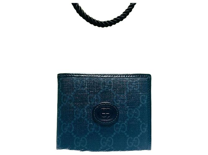 Gucci Cartera compacta Interlocking GG Castaño