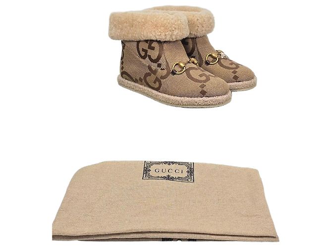 Gucci Botas de cano de tornozelo em lona Jumbo GG e shearling com mors Multicor