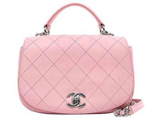 Chanel Bolsa de alça superior com aba acolchoada em pele de cordeiro rosa