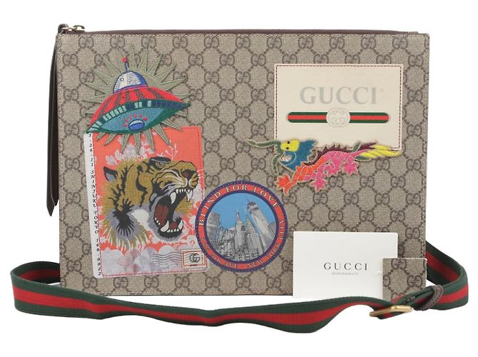 Gucci Borsa a tracolla GG Supreme Canvas con patch Courier Multicolore