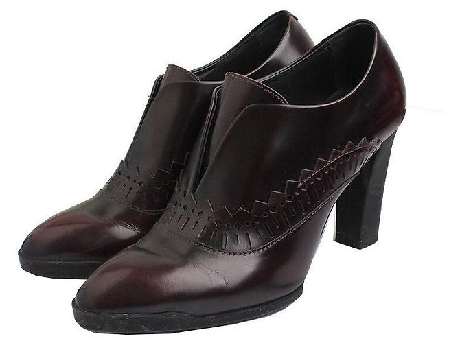 Tod's Bota de cuero perforado burdeos Roja