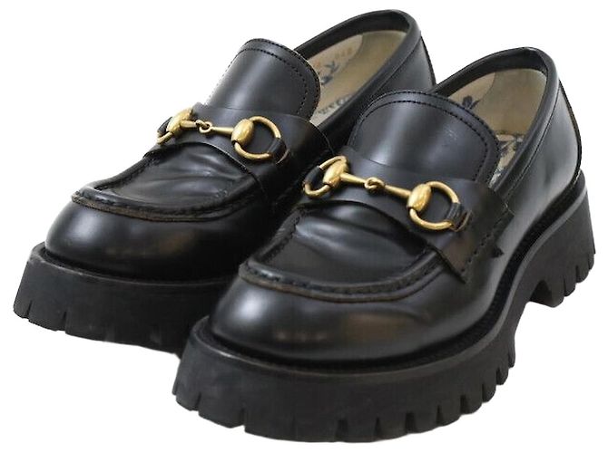 Gucci Mocassins de couro com sola tratorada preta