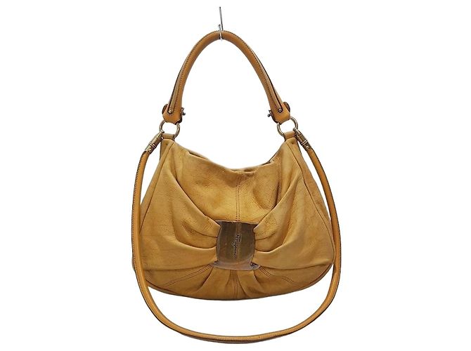 Salvatore Ferragamo Bolsa de ombro em couro nubuck com decoração de marca Marrom