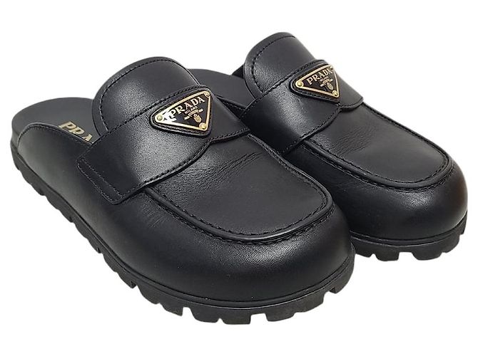 Prada Mule in pelle con logo triangolare nero