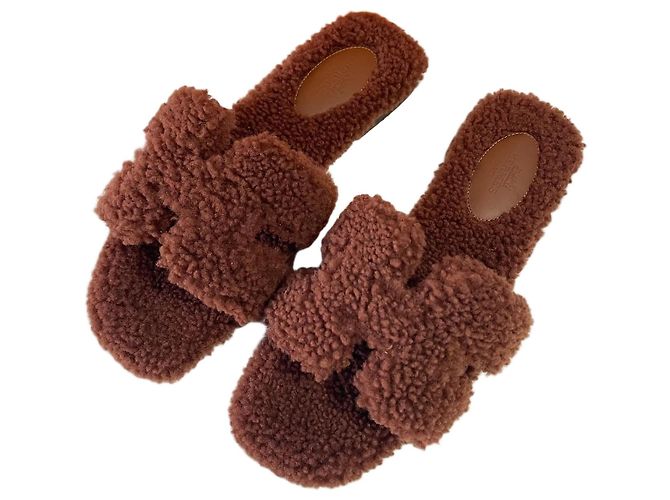 Hermès Oran Shearling Sandalen Gold Rot